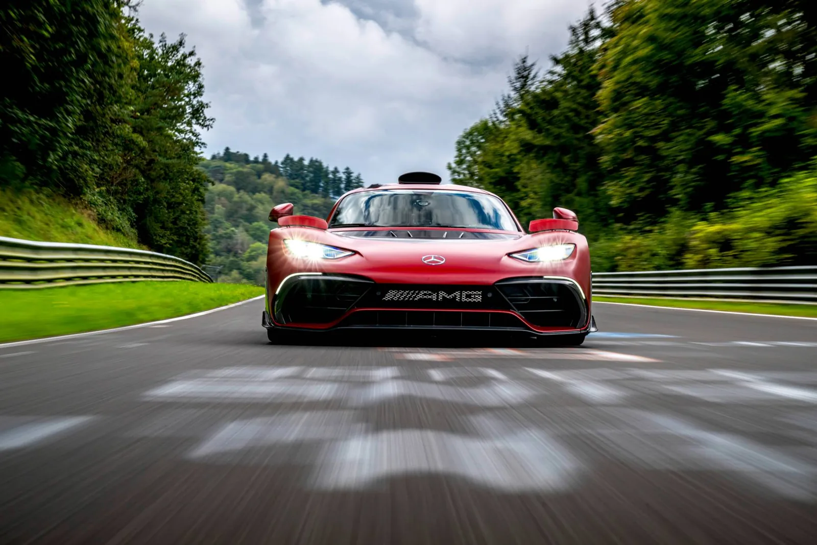 Mercedes-AMG ONE head-on on the Nürburgring Nordschleife during the September 2024 record run, headlights lit