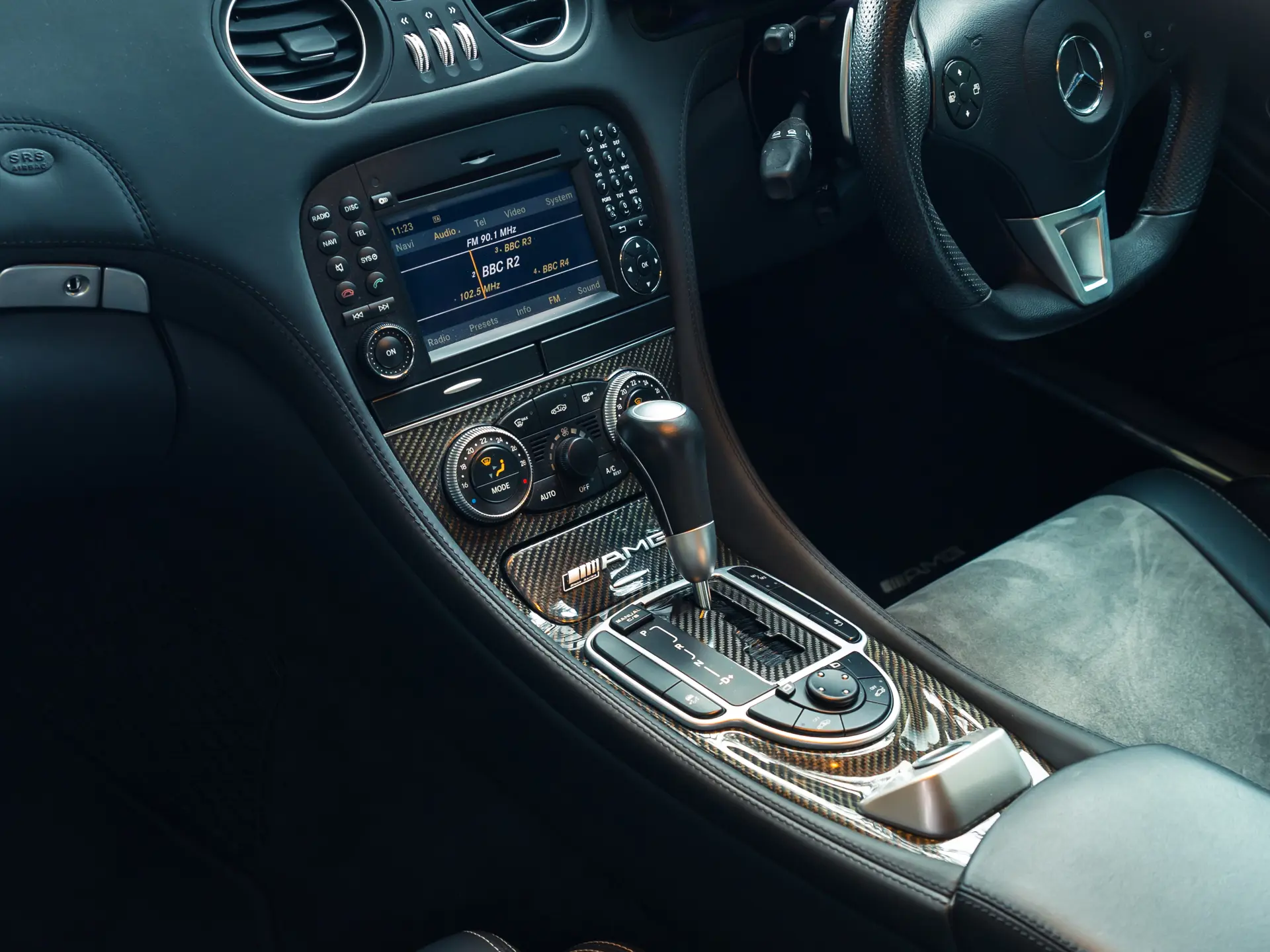 2009 Mercedes SL65 AMG Black Series cockpit — black leather, Alcantara, carbon-fibre dashboard trim, COMAND infotainment