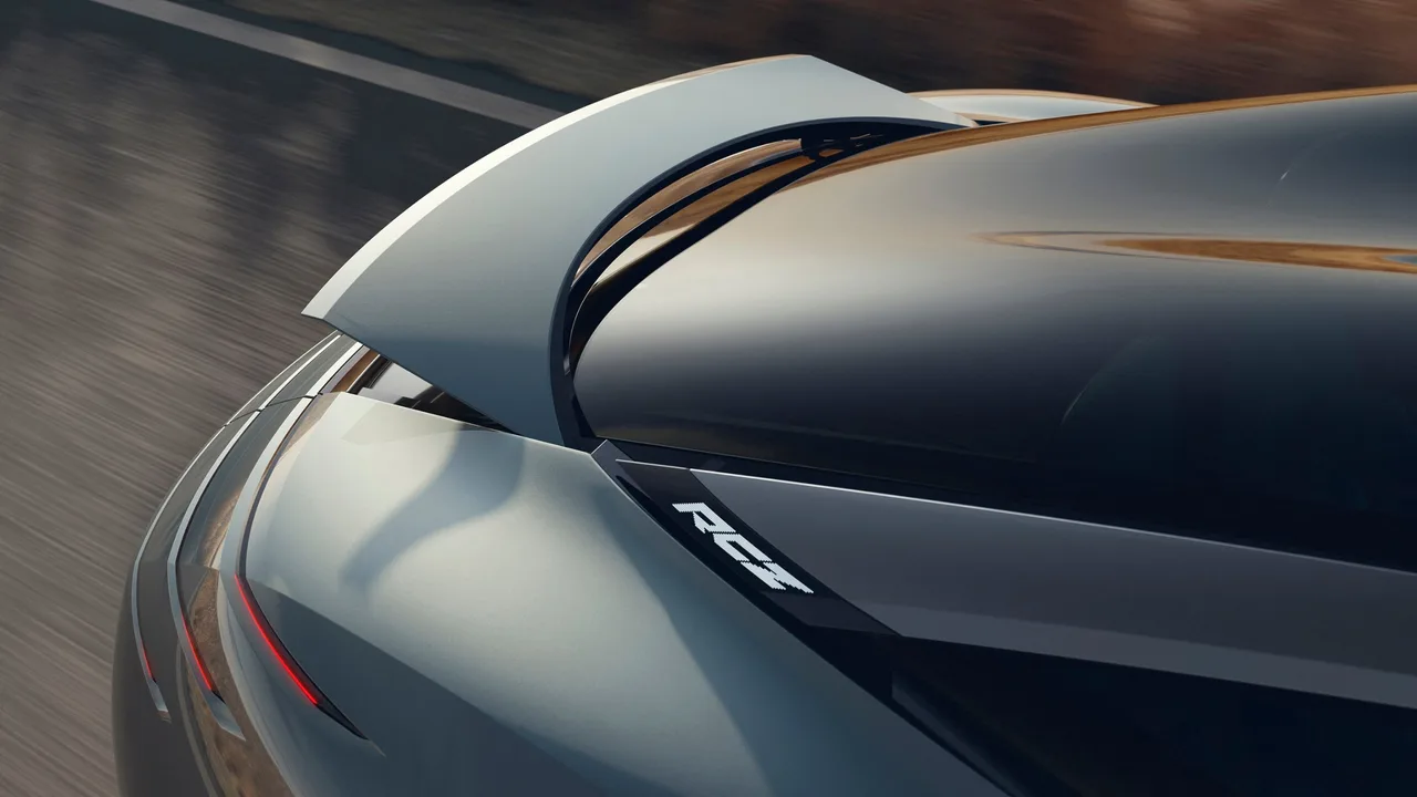 Active rear spoiler of the Peugeot RCZ Vision deployed while driving, with RCZ lettering