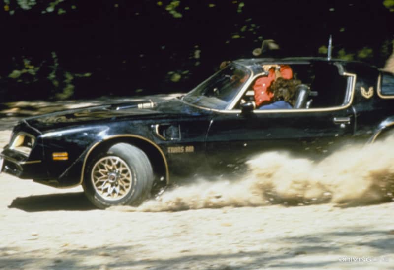 Pontiac Trans Am sliding on a dirt road in Smokey and the Bandit