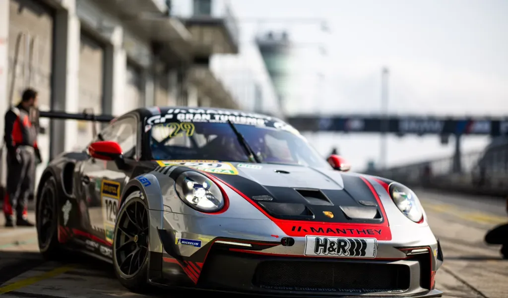 Manthey-run Porsche 911 GT3 Cup number 129 in the Nürburgring pit lane