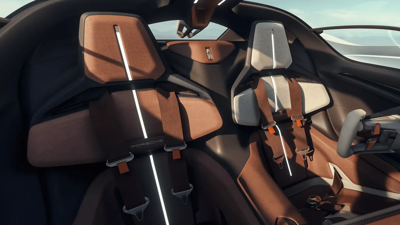 Porsche Mission X concept interior with two seats with harnesses and a yoke steering wheel