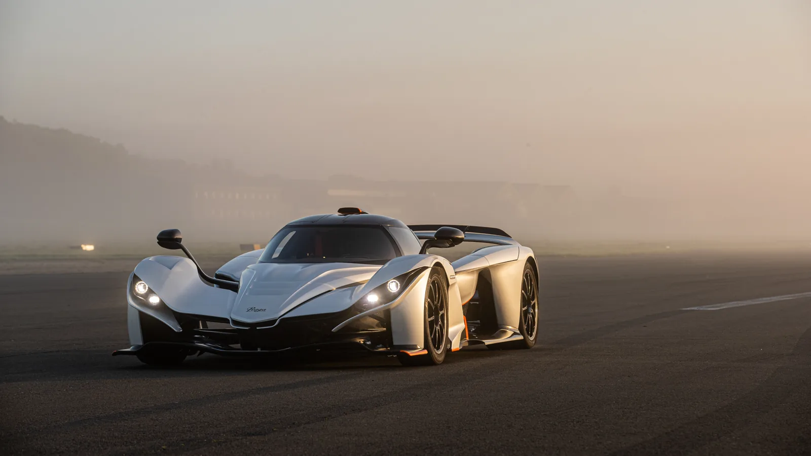 Silver Praga Bohema on a runway in morning fog, front view