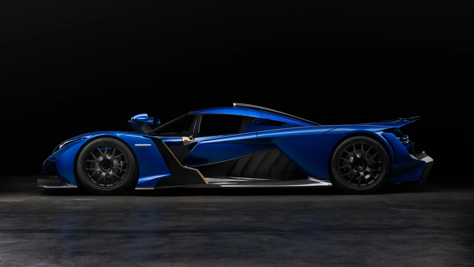 Blue Praga Bohema side profile in a dark studio