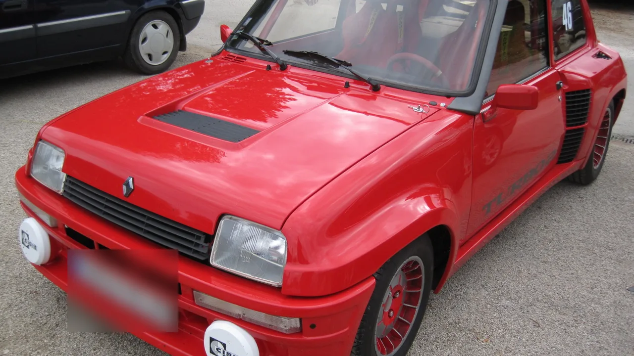 Red original Renault 5 Turbo 2 with bonnet vent, wide front arches and Cibié auxiliary lights