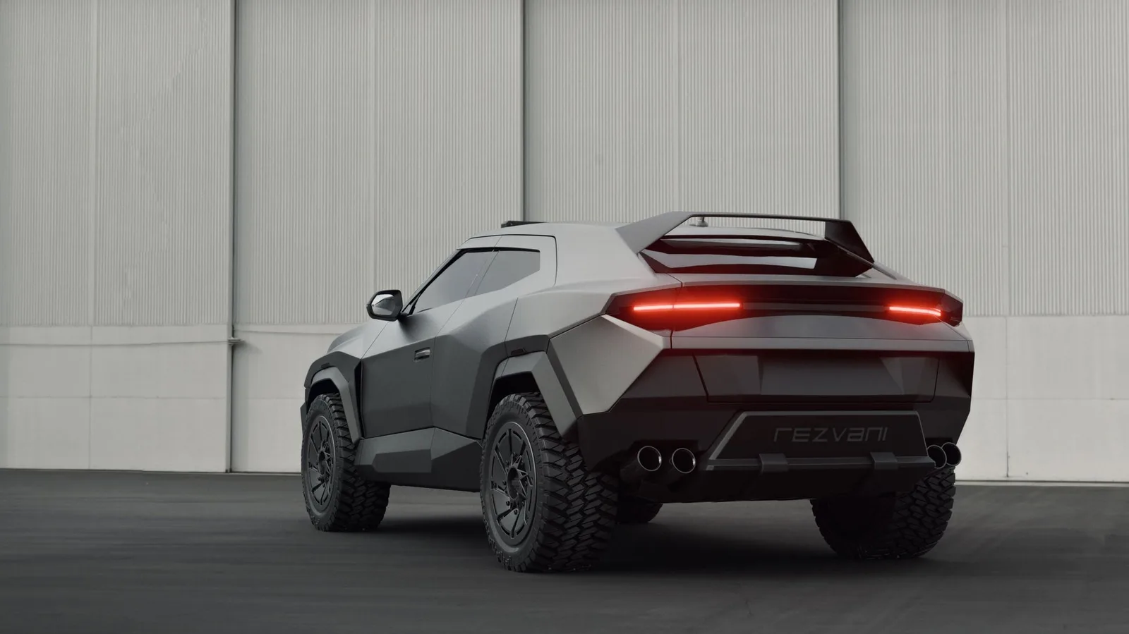 Rezvani Knight Dark Knight rear studio shot showing carbon fibre wide-body and quad exhaust