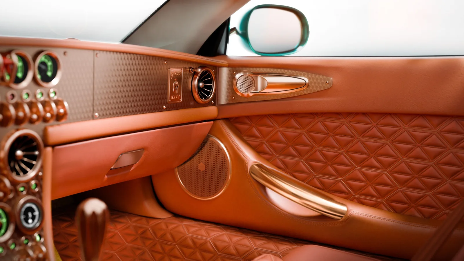 Spyker C8 Preliator XXV quilted Tuscan Saddle leather door card with rose-gold air vents and grab handle