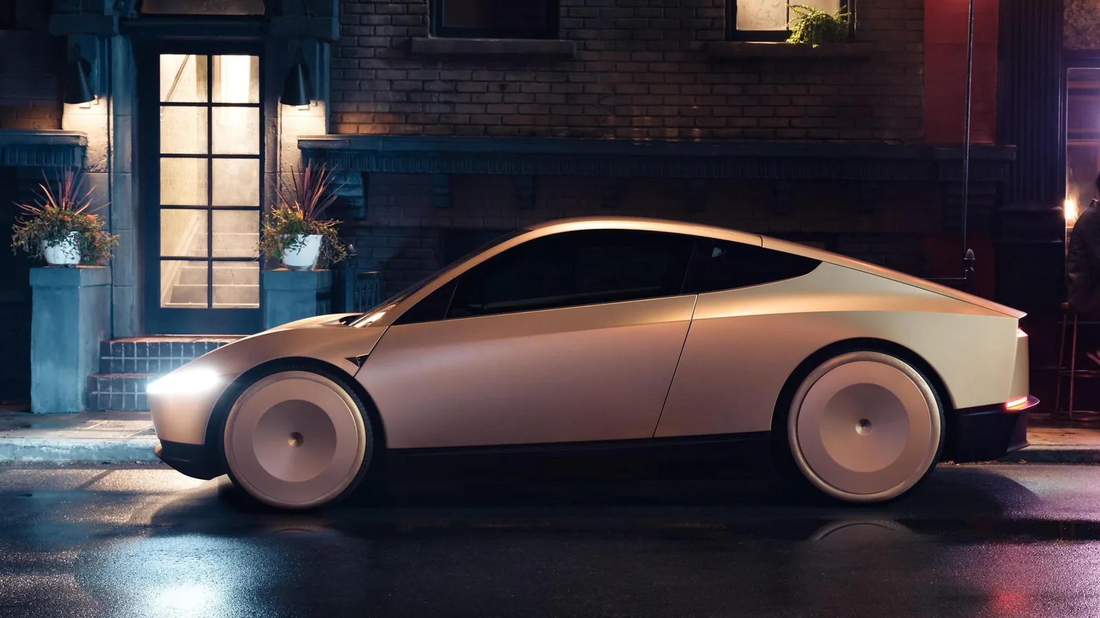 Tesla Cybercab front view showing the light bar, flush surfaces and absence of side mirrors
