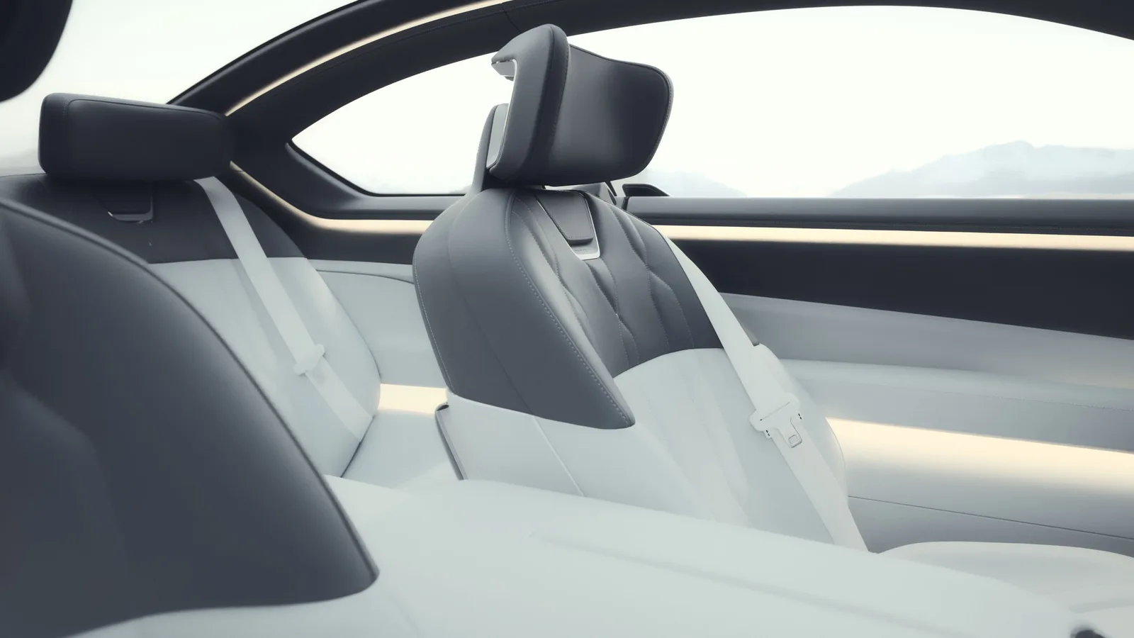 Vision BMW Alpina rear seat detail with curved frameless glass section — quilted diamond pattern leather and absence of conventional B-pillar