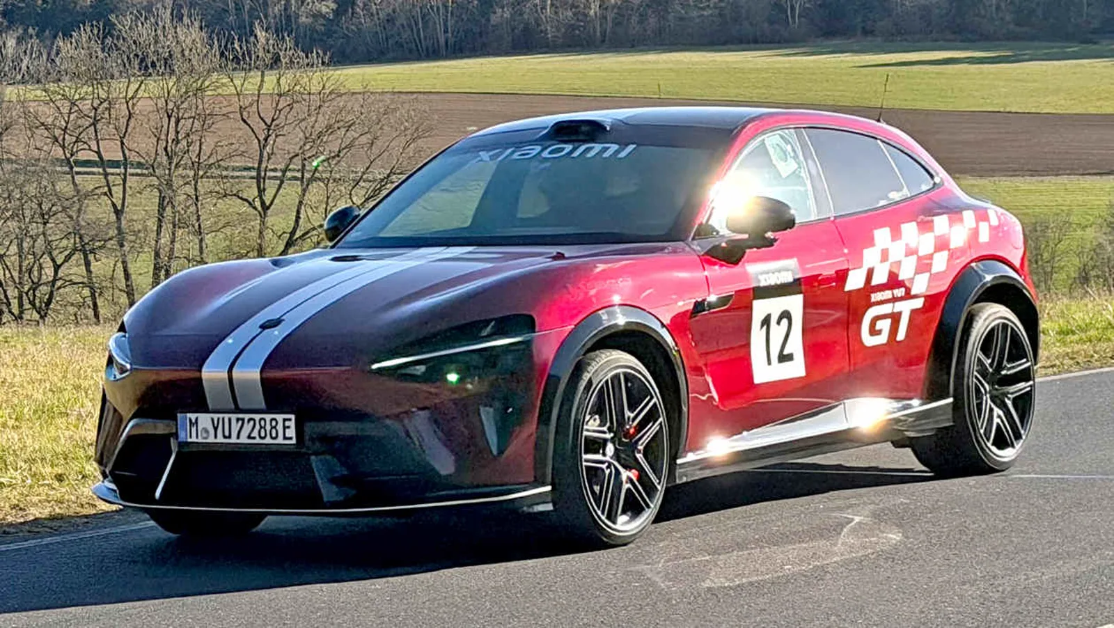 Xiaomi YU7 GT front three-quarter — silhouette comparison highlights its Ferrari Purosangue-inspired proportions