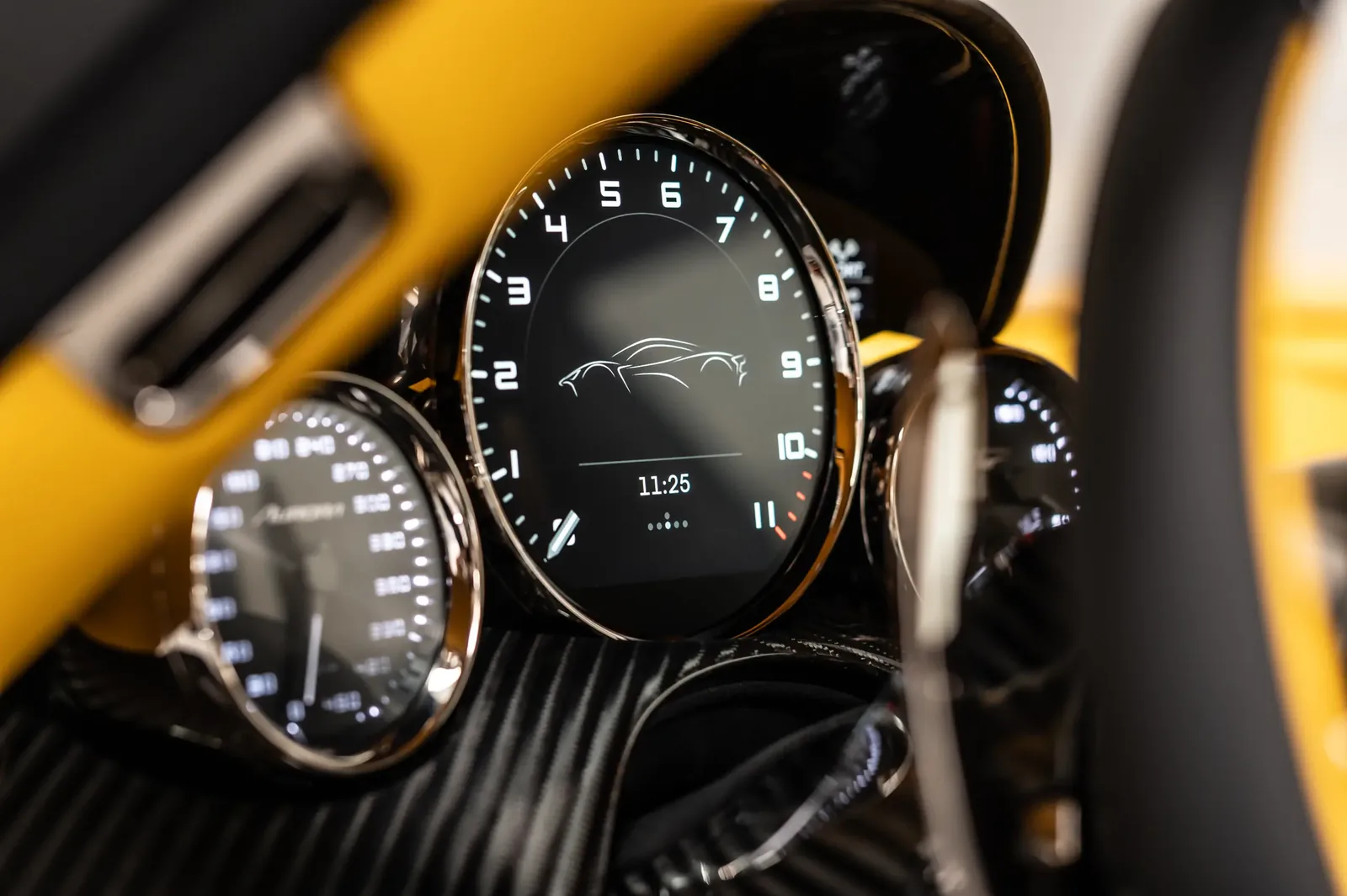 Zenvo Aurora Tur analog tachometer close-up with 9800 rpm redline