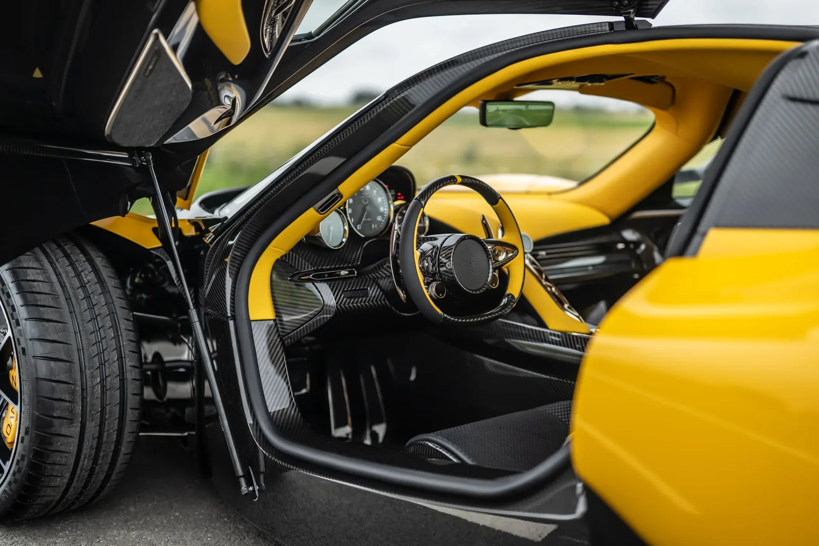 Zenvo Aurora Tur cabin with driver-focused steering wheel