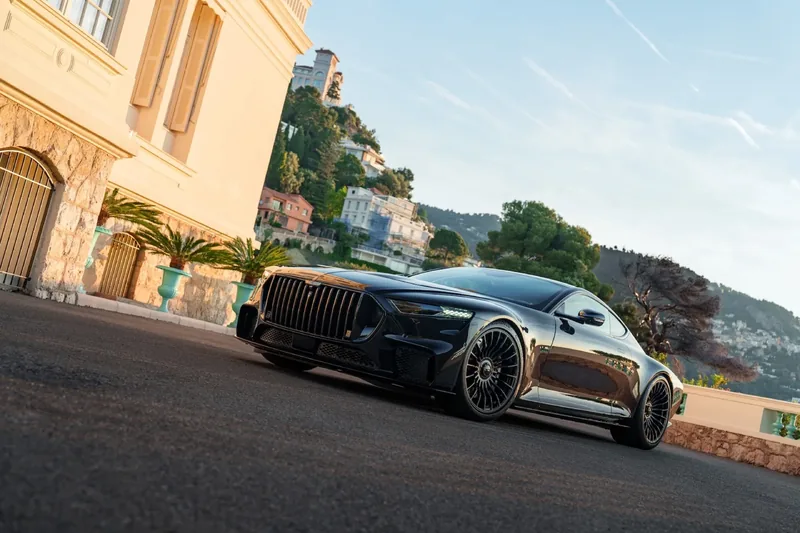 Brabus Bodo 1,000 PS V12 coupe at FuoriConcorso 2026 — Piano Black carbon-fiber 2+2 grand tourer on Aston Martin Vanquish chassis
