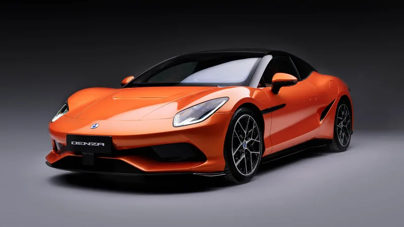 Denza Z at Goodwood Festival of Speed 2026 — 1,582 hp tri-motor electric supercar in Coupe, Spider and Racing trims with prominent fixed rear wing and dark studio backdrop