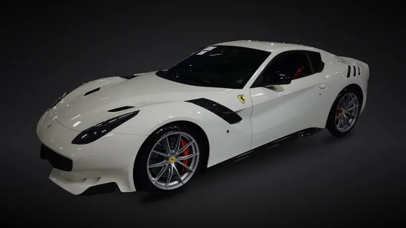 White Ferrari F12tdf in a dark studio — Ferrari models guide