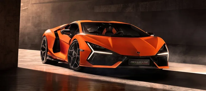 Lamborghini Revuelto vs Ferrari 849 Testarossa 2026 — V12 naturally aspirated hybrid vs twin-turbo V8 plug-in hybrid Italian flagship comparison